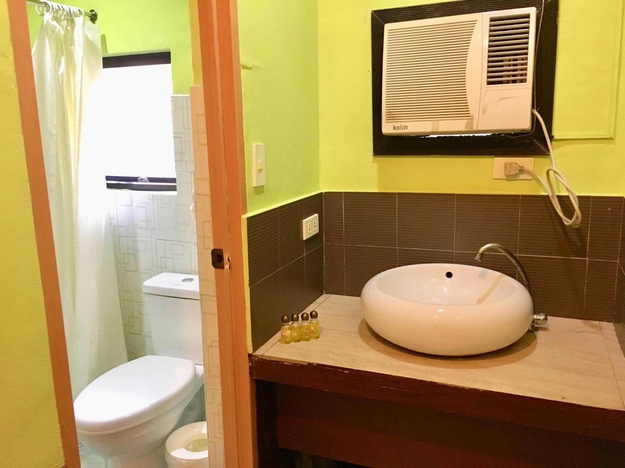Eon Centennial Resort Hotel & Waterpark Iloilo Rom bilde